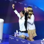 17-year-old Ami Nakai hugs Alysa Liu after both skaters medal at Olympics